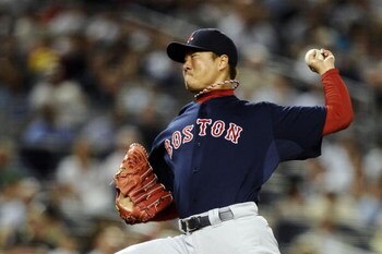 NEW YORK - AUGUST 07:  Relief pitcher Hideki Okajima #37 of the Boston Red Sox pitches against the New York Yankees on August 7, 2009 at Yankee Stadium in the Bronx borough of New York City.  (Photo by Jeff Zelevansky/Getty Images)