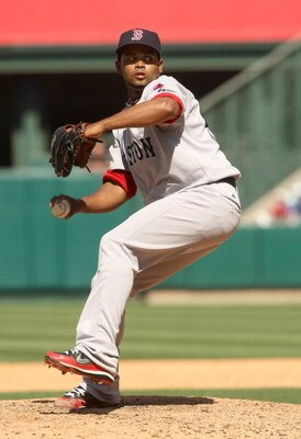 ANAHEIM, CA - MAY 14:  Pitcher Ramon Ramirez #56 of the Boston Red Sox throws a pitch against the Los Angeles Angels of Anaheim on May 14, 2009 at Angel Stadium in Anaheim, California.  (Photo by Stephen Dunn/Getty Images)