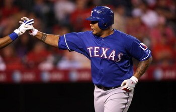 ANAHEIM, CA - JULY 08:  Andruw Jones #25 of the Texas Rangers celebrates after hitting his third home run of the game against the Los Angeles Angels of Anaheim in the fifth inning at Angel Stadium July 8, 2009 in Anaheim, California.  (Photo by Stephen Du