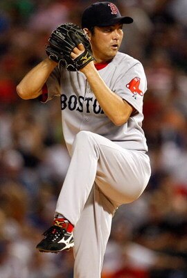 ARLINGTON, TX - JULY 20:  PitcherTakashi Saito #24 of the Boston Red Sox on July 20, 2009 at Rangers Ballpark in Arlington, Texas.  (Photo by Ronald Martinez/Getty Images)