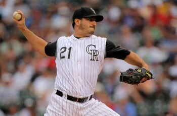 DENVER - JULY 11:  Starting pitcher Jason Marquis #21 of the Colorado Rockies delivers against the Atlanta Braves during MLB action at Coors Field on July 11, 2009 in Denver, Colorado.  (Photo by Doug Pensinger/Getty Images)