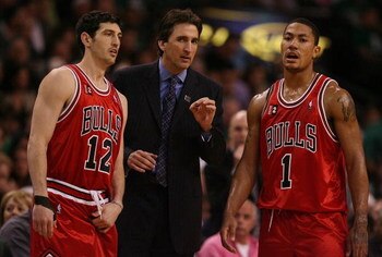 BOSTON - MAY 02:  Head coach Vinny Del Negro of the Chicago Bulls talks with Derrick Rose #1 and Kirck Hinrich #12 in the second half against the Boston Celtics in Game Seven of the Eastern Conference Quarterfinals during the 2009 NBA Playoffs at TD Bankn