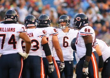 ORCHARD PARK, NY - AUGUST 15:  Jay Cutler #6 of the Chicago Bears huddles with teammates against the Buffalo Bills on  August 15, 2009 at Ralph Wilson Stadium in Orchard Park, New York.  (Photo by Rick Stewart/Getty Images)