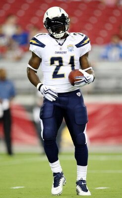 GLENDALE, ARIZONA - AUGUST 22:  Running back LaDainian Tomlinson #21 of the San Diego Chargers warms up before the game against  the Arizona Cardinals at the University of Phoenix Stadium on August 22, 2009 in Glendale, Arizona. (Photo by Christian Peters