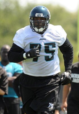 JACKSONVILLE, FL - MAY 1:  Tackle Eugene Monroe #75 of the Jacksonville Jaguars sets to block May 1, 2009 at a team minicamp near Jacksonville Municipal Stadium in Jacksonville, Florida.  (Photo by Al Messerschmidt/Getty Images)