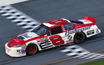 DAYTONA BEACH, FL - FEBRUARY 15: Dale Earnhardt, Jr. driver of the #8 Budweiser Chevrolet Monte Carlo, crosses the finish line on his way toward winning the Daytona 500 on February 15, 2004 at Daytona International Speedway in Daytona Beach, Florida.  (Ph