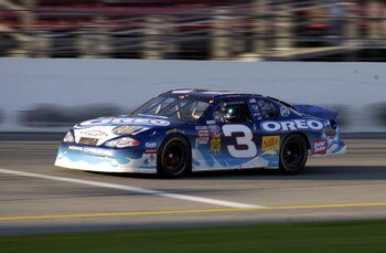 Dale Earnhardt Jr. racing in the Nascar Busch Series EAS/GNC Live Well 300 in the #3 car at Daytona Speedway on Feb. 16, 2002. Photo by Gabe Palacio/ImageDirect