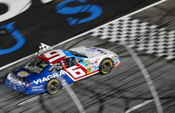CONCORD, NC - MAY 21:  Mark Martin, driver of the #6 Viagra Ford, drives a victory lap after winning the NASCAR Nextel Cup All-Star Challenge at Lowe's Motor Speedway on May 21, 2005 in Concord, North Carolina.  (Photo by Craig Jones/Getty Images)