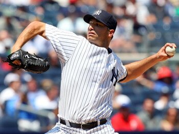 NEW YORK - JULY 06:  Andy Pettitte #46 of the New York Yankees pitches against the Toronto Blue Jays on July 6, 2009 at Yankee Stadium in the Bronx borough of New York City.  (Photo by Jim McIsaac/Getty Images)