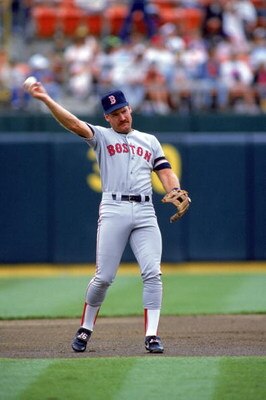 1990:  Wade Boggs #26 of the Boston Red Sox throws the ball during a game in 1989.  (Photo by Otto Greule Jr/Getty Images)  