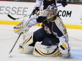 NASHVILLE, TN - FEBRUARY 05: Pekka Rinne #35 of the Nashville Predators makes the stop against the Anaheim Ducks on February 5, 2009 at the Sommet Center in Nashville, Tennessee. (Photo by Bruce Bennett/Getty Images)