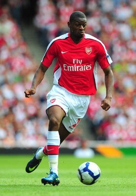 LONDON, ENGLAND - AUGUST 22:  Abou Diaby of Arsenal runs with the ball during the Barclays Premier League match between Arsenal and Portsmouth at the Emirates Stadium on August 22, 2009 in London, England.  (Photo by Mike Hewitt/Getty Images)