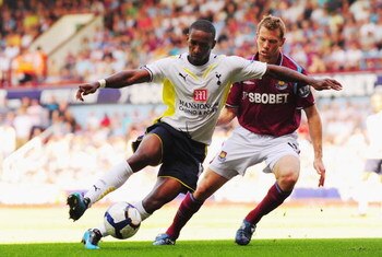 LONDON, ENGLAND - AUGUST 23:  Jermain Defoe of Tottenham is challenged by Jonathan Spector of West Ham during the Barclays Premier League match between West Ham United and Tottenham Hotspur on August 23, 2009 in London, England.  (Photo by Mike Hewitt/Get