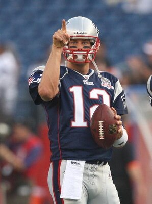 FOXBORO, MA - AUGUST 20:  Tom Brady #12 of the New England Patriots prepares to throw before a game against the Cincinnati Bengals at Gillette Stadium on August 20, 2009 in Foxboro, Massachusetts. (Photo by Jim Rogash/Getty Images)