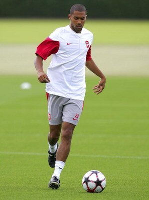 ST ALBANS, ENGLAND - AUGUST 17: Gael Clichy warms up during an Arsenal training session prior to Tuesday's Champions League fixture against Celtic at London Colney training ground on August 17, 2009 in St Albans, England. (Photo by Tom Dulat/Getty Images)