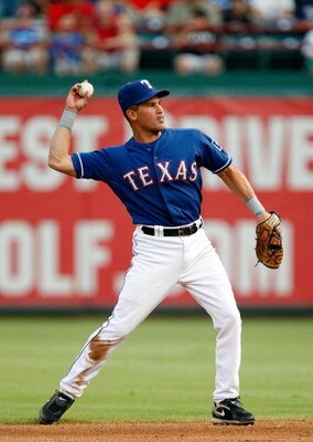 ARLINGTON, TX - JULY 31:   Omar Vizquel #13 of the Texas Rangers on July 31, 2009 at Rangers Ballpark in Arlington, Texas.  (Photo by Ronald Martinez/Getty Images)