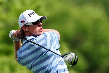 CHASKA, MN - AUGUST 13:  Hunter Mahan hits his tee shot on the fifth hole during the first round of the 91st PGA Championship at Hazeltine National Golf Club on August 13, 2009 in Chaska, Minnesota.  (Photo by Stuart Franklin/Getty Images)