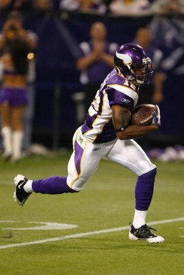 MINNEAPOLIS, MN - AUGUST 21: Wide receiver Percy Harvin #12 of the Minnesota Vikings runs with the football against the Kansas City Chiefs at Hubert H. Humphrey Metrodome on August 21, 2009 in Minneapolis, Minnesota. The Vikings defeated the Chiefs 17-13.