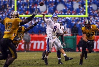KANSAS CITY, MO - NOVEMBER 29:  Quarterback Todd Reesing #5 of the Kansas Jayhawks passes during the second half of the game against the Missouri Tigers on November 29, 2008 at Arrowhead Stadium in Kansas City, Missouri.  (Photo by Jamie Squire/Getty Imag