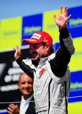 VALENCIA, SPAIN - AUGUST 23:  Rubens Barrichello of Brazil and Brawn GP celebrates on the podium after winning the European Formula One Grand Prix at the Valencia Street Circuit on August 23, 2009, in Valencia, Spain.  (Photo by Clive Mason/Getty Images)