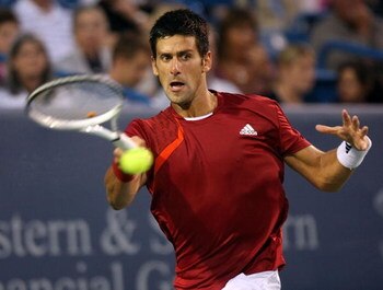 CINCINNATI - AUGUST 22:  Novak Djokovic of Serbia hits a forehand against Rafael Nadal of Spain in their semi final during day six of the Western & Southern Financial Group Masters on August 22, 2009 at the Lindner Family Tennis Center in Cincinnati, Ohio