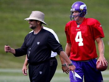 EDEN PRAIRIE, MN - AUGUST 18:  Minnesota Vikings Head Coach Brad Childress (L) walks with Brett Favre #4 after finishing  a passing drill during a Minnesota Vikings practice session on August 18, 2009 at Winter Park in Eden Prairie, Minnesota. Favre has r