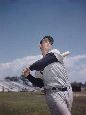 BOSTON - CIRCA 1955:  (UNDATED FILE PHOTO) Baseball legend Ted Williams (1918 - 2002) of the Boston Red Sox  swings a bat in this portrait circa 1955. The 83-year-old Williams, who was the last major league player to bat .400 when he hit .406 in 1941, die