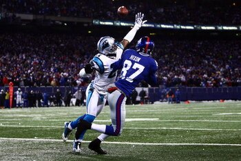 EAST RUTHERFORD, NJ - DECEMBER 21:  Cornerback Ken Lucas #21 of the Carolina Panthers interfears with wide receiver Domenik Hixon #87 of the New York Giants on December 21, 2008 at Giants Stadium in East Rutherford, New Jersey.  (Photo by Chris McGrath/Ge