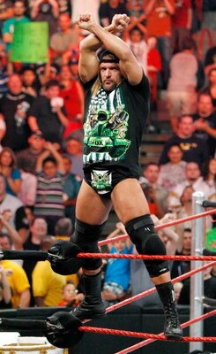 LAS VEGAS - AUGUST 24:  Wrestler Triple H gestures to the crowd during the WWE Monday Night Raw show at the Thomas & Mack Center August 24, 2009 in Las Vegas, Nevada.  (Photo by Ethan Miller/Getty Images)