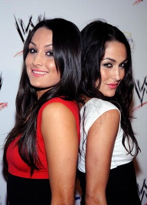 HOLLYWOOD - AUGUST 21:  Wrestlers The Bellas Twins Nikki Bella and Brie Bella arrive at the WWE's SummerSlam Kickoff Party at H-Wood Club on August 21, 2009 in Hollywood, California.  (Photo by Frazer Harrison/Getty Images)