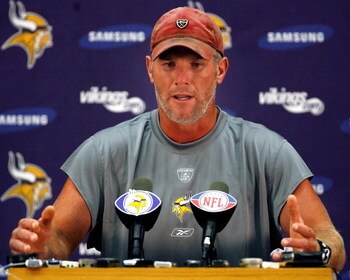 EDEN PRAIRIE, MN - AUGUST 18: Brett Favre talks with the media after his first practice with the Minnesota Vikings on August 18, 2009 at Winter Park in Eden Prairie, Minnesota.  (Photo by Scott A. Schneider/Getty Images)