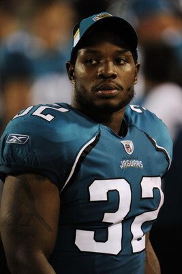 JACKSONVILLE, FL - AUGUST 22:  Running back Maurice Jones-Drew #32 of the Jacksonville Jaguars watches from the sidelines during the game against the Tampa Bay Buccaneers at Jacksonville Municipal Stadium on August 22, 2009 in Jacksonville, Florida.  (Pho