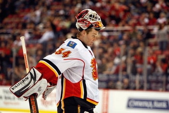 DETROIT - MARCH 12:  Miikka Kiprusoff #34 of the Calgary Flames looks on during the game against the Detroit Red Wings on March 12, 2009 at Joe Louis Arena in Detroit, Michigan. (Photo by Gregory Shamus/Getty Images)