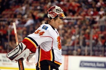 DETROIT - MARCH 12:  Miikka Kiprusoff #34 of the Calgary Flames looks on during the game against the Detroit Red Wings on March 12, 2009 at Joe Louis Arena in Detroit, Michigan. (Photo by Gregory Shamus/Getty Images)