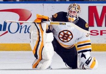 UNIONDALE, NY - APRIL 12:  Tim Thomas #30 of the Boston Bruins looks on against the New York Islanders on April 12, 2009 at Nassau Coliseum in Uniondale, New York. The Bruins won the game 6-2.  (Photo by Jim McIsaac/Getty Images)