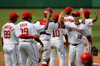WASHINGTON - AUGUST 06:  The Washington Nationals celebrate their 12-8 victory over the Florida Marlins at Nationals Park on August 6, 2009 in Washington, DC.  (Photo by Doug Pensinger/Getty Images)