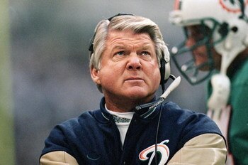 25 Nov 1999:  Head coach Jimmy Johnson  of the Miami Dolphins looks at the scoreboard during the game against the Dallas Cowboys  at the Texas Stadium in Irving, Texas. The Cowboys defeated the Dolphins 20-3. Mandatory Credit: Ronald Martinez  /Allsport