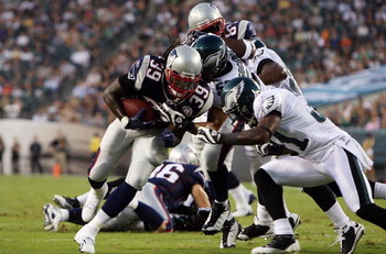 PHILADELPHIA - AUGUST 13: Laurence Maroney #39 of the New England Patriots runs the ball for a first down against the Philadelphia Eagles on August 13, 2009 at Lincoln Financial Field in Philadelphia, Pennsylvania. (Photo by Jim McIsaac/Getty Images)