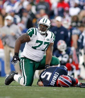 ORCHARD PARK, NY - NOVEMBER 02: Kris Jenkins #77 of the New York Jets gets up after sacking Trent Edwards #5 of the Buffalo Bills  on November 2, 2008 at Ralph Wilson Stadium in Orchard Park, New York. New York won 26-17.  (Photo by Rick Stewart/Getty Ima
