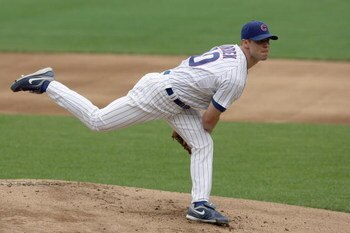 CHICAGO - JULY 26: Rich Harden #40 of the Chicago Cubs delivers the pitch during the game against the Cincinnati Reds on July 26, 2009 at Wrigley Field in Chicago, Illinois. (Photo by Jonathan Daniel/Getty Images) 
