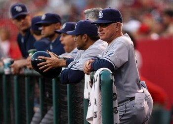 ANAHEIM, CA - AUGUST 11:    Manager Joe Maddon of the Tampa Bay Rays looks on during the game with the Los Angeles Angels of Anaheim on August 11, 2009 at Angel Stadium in Anaheim, California.   (Photo by Stephen Dunn/Getty Images)