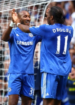 LONDON, ENGLAND - AUGUST 29:  Nicolas Anelka of Chelsea celebrates scoring the opening goal with teammate Didier Drogba during the Barclays Premier League match between Chelsea and Burnley at Stamford Bridge on August 29, 2009 in London, England.  (Photo 