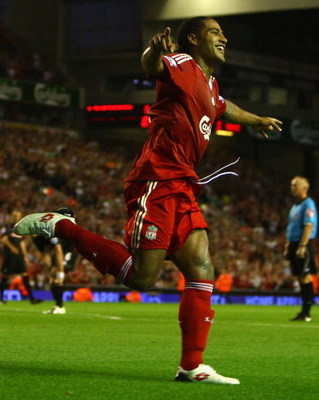 LIVERPOOL, ENGLAND - AUGUST 19:  Glen Johnson of Liverpool celebrates scoring his team's second goal during the Barclays Premier League match between Liverpool and Stoke City at Anfield on August 19, 2009 in Liverpool, England.  (Photo by Clive Brunskill/