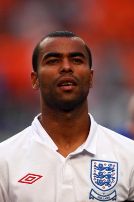AMSTERDAM, NETHERLANDS - AUGUST 12:  Ashley Cole of England stands for the national anthem prior to the International Friendly between Netherlands and England at the Amsterdam Arena on August 12, 2009 in Amsterdam, Netherlands.  (Photo by Phil Cole/Getty 