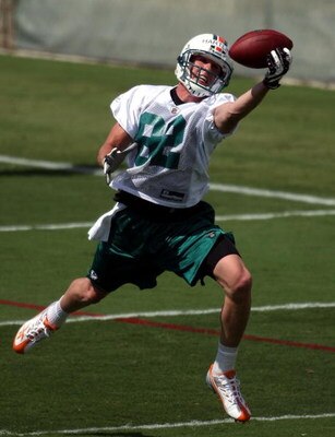 DAVIE, FL - MAY 02:  Rookie wide receiver Brian Hartline #82 of the Miami Dolphins catches a ball during mini camp on May 2, 2009 at the Miami Dolphins Training facility in Davie, Florida.  (Photo by Marc Serota/Getty Images)