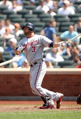NEW YORK - APRIL 26:  Jesus Flores #3 of the Washington Nationals bats against the New York Mets on April 26, 2009 at Citi Field in the Flushing neighborhood of the Queens borough of New York City.  (Photo by Ezra Shaw/Getty Images)