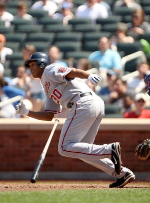 NEW YORK - APRIL 26:  Justin Maxwell #30 of the Washington Nationals bats against the New York Mets on April 26, 2009 at Citi Field in the Flushing neighborhood of the Queens borough of New York City.  (Photo by Ezra Shaw/Getty Images)