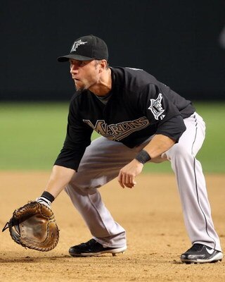 PHOENIX - JULY 10:  Infielder Ross Gload #7 of the Florida Marlins in action during the major league baseball game against the Arizona Diamondbacks at Chase Field on July 10, 2009 in Phoenix, Arizona.  The Diamondbacks defeated the Marlins 8-0.  (Photo by