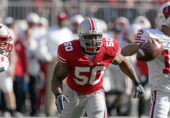 COLUMBUS, OH - NOVEMBER 03: Vernon Gholston #50 of the Ohio State Buckeyes moves to sack Tyler Donovan #12 of the Wisconsin Badgers on November 3, 2007 at Ohio Stadium in Columbus, Ohio. Ohio State defeated Wisconsin 38-17. (Photo by Jonathan Daniel/Gett