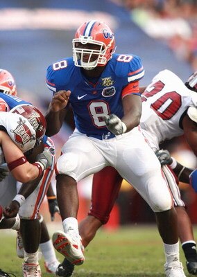 GAINESVILLE, FL - SEPTEMBER 08:  Defensive end Carlos Dunlap #8 of the Florida Gators plays defense against the Troy Trojans at Ben Hill Griffin Stadium on September 8, 2007 in Gainesville, Florida. (Photo by Doug Benc/Getty Images)